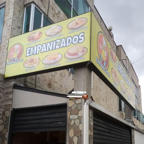 avisos caja de luz en panaflex para fachada de empanizados, gran formato